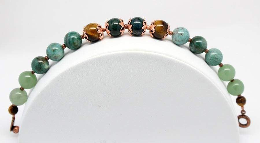 https://junebugjewelrydesigns.com/cdn/shop/files/prosperity-semi-precious-gemstone-beaded-bracelet-affordable-fashion-jewelry-beaded-bracelets-beautiful-handmade-jewelry-bohemian-bracelet-boho-bracelet-952_1024x.jpg?v=1706147750
